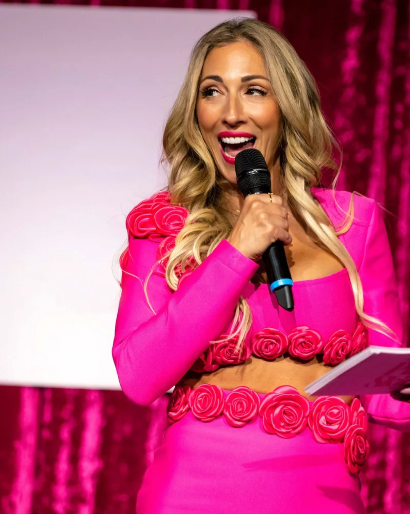 Anita Guerini speaking on stage